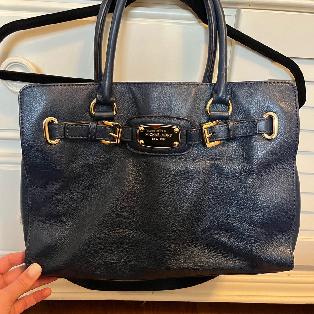 Navy Michael Kors purse. A lot of pockets for organization!